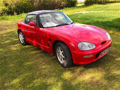 The Suzuki Cappuccino measures 3295 mm in length, 1395 mm in width, and 1185 mm in height. This is a small car with a fashionable look, featuring a long engine compartment and a short rear. Interior. As the car has only two seats, it can fit only that many people and the legroom is not very spacious either. 